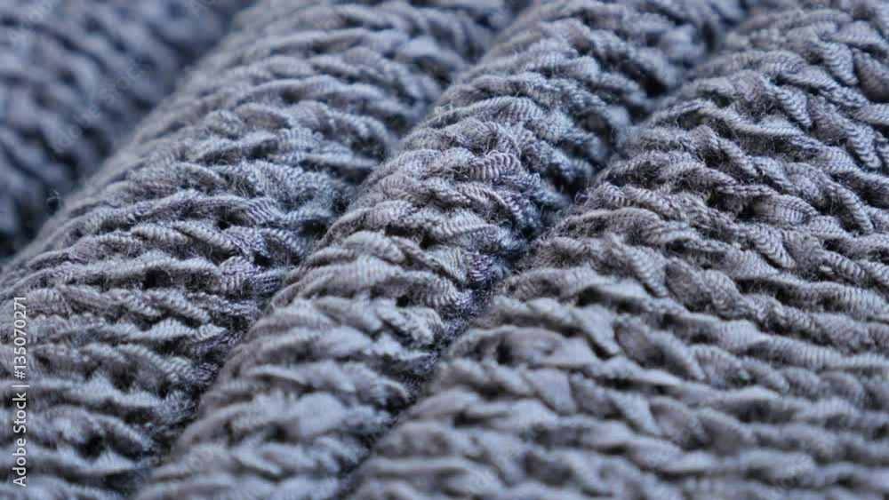Knitting made sweater details shallow DOF 4K 2160p 30fps UltraHD tilting footage - Slow tilt on modern texture of gray clothing knitwork close-up 3840X2160 UHD tvideo Knitting made sweater details shallow DOF 4K 2160p 30fps UltraHD tilting footage - Slow tilt on modern texture of gray clothing knitwork close-up 3840X2160 UHD tvideo
