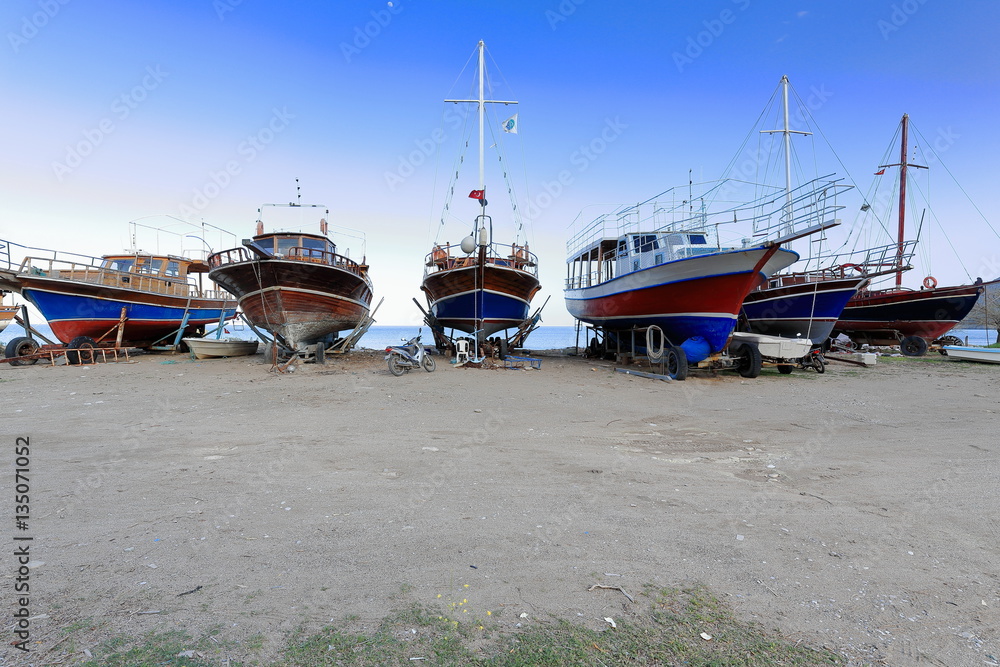 Local touristic ships stranded on the beach. Çirali-Turkey. 03