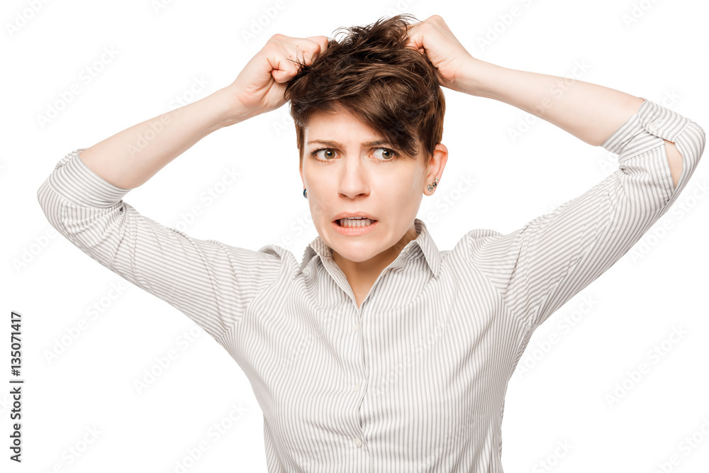 crazy angry woman tearing her hair on a white background crazy angry woman tearing her hair on a white background