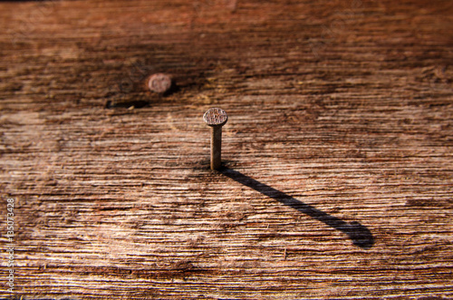 Fotografi shadow of alone nail