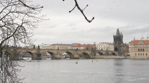 Scenery in Czechia capital with Vltava river and Charles bridge 4K 2160p 30fps UltraHD footage - Famous cityscape of Prague by the day 3840X2160 UHD video  photo