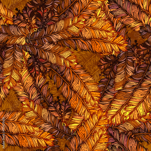 Gold seamless pattern with randomly bird feathers