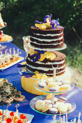 Celebration. Beautiful wedding cake on a festive table  catering