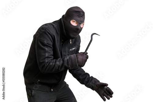 Obraz na plátně Masked thief in balaclava with crowbar isolated on white