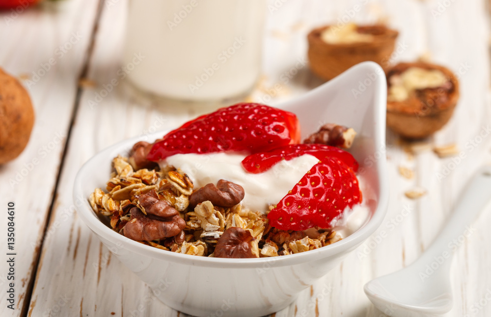 Homemade granola with fresh strawberries, yogurt and walnuts
Homemade granola with fresh strawberries, yogurt and walnuts