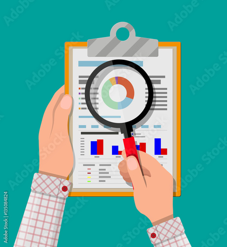 clipboard with financial reports and pen