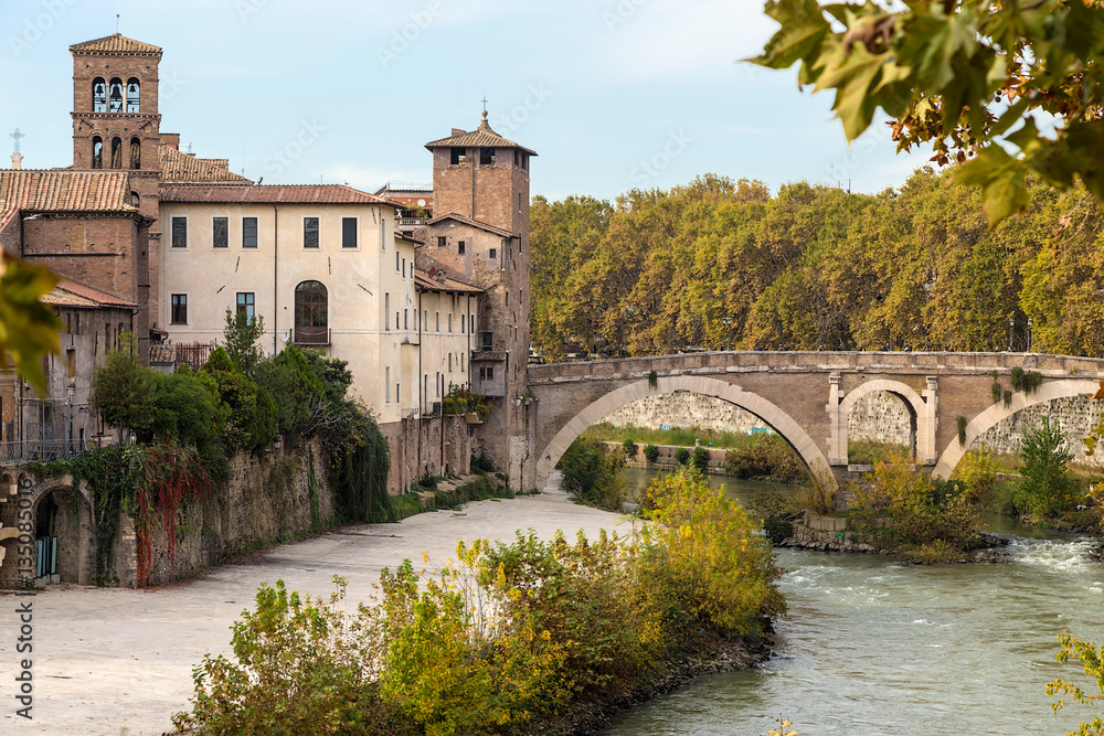 Rome, Italy. Tiberina Island and Pons Fabricius is the oldest surviving bridge in Rome. built in 62 BC