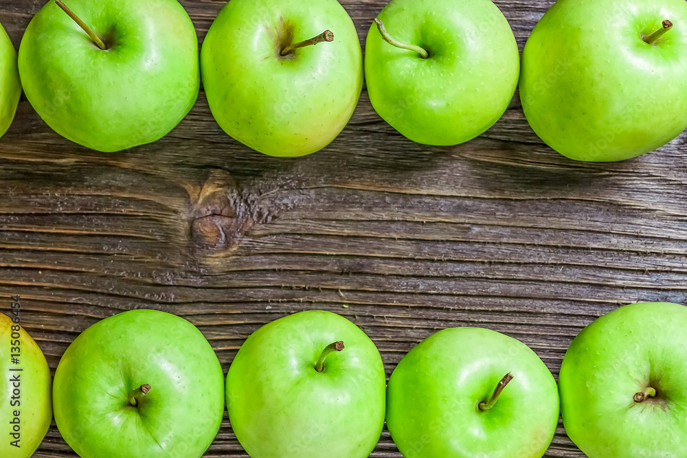 Ripe green apples on wooden background Ripe green apples on wooden background