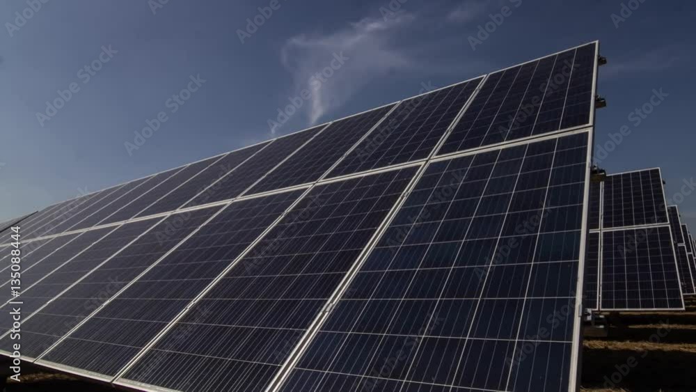 Solar panels tracking the sun, time lapse shot Solar panels tracking the sun, time lapse shot