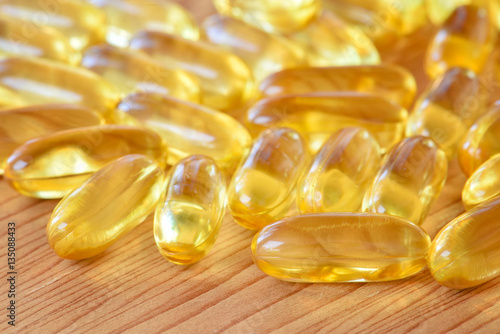 Closeup fish oil omega3 on plank