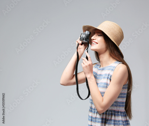Woman traveler taking pictu...