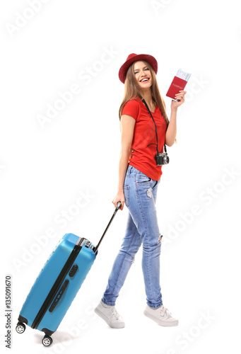 Woman traveler with passpor...