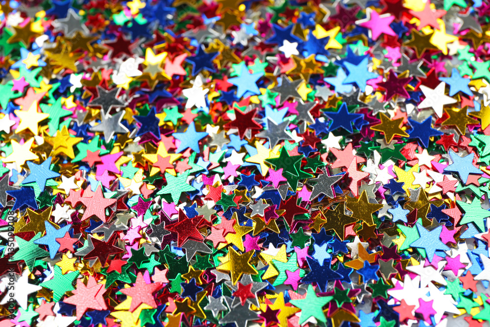 Bright confetti in shape of star, closeup Bright confetti in shape of star, closeup
