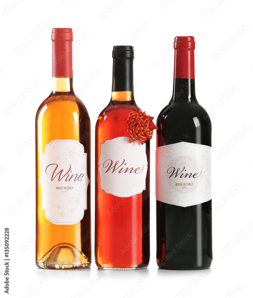St. Valentines Day concept. Three wine bottles isolated on white