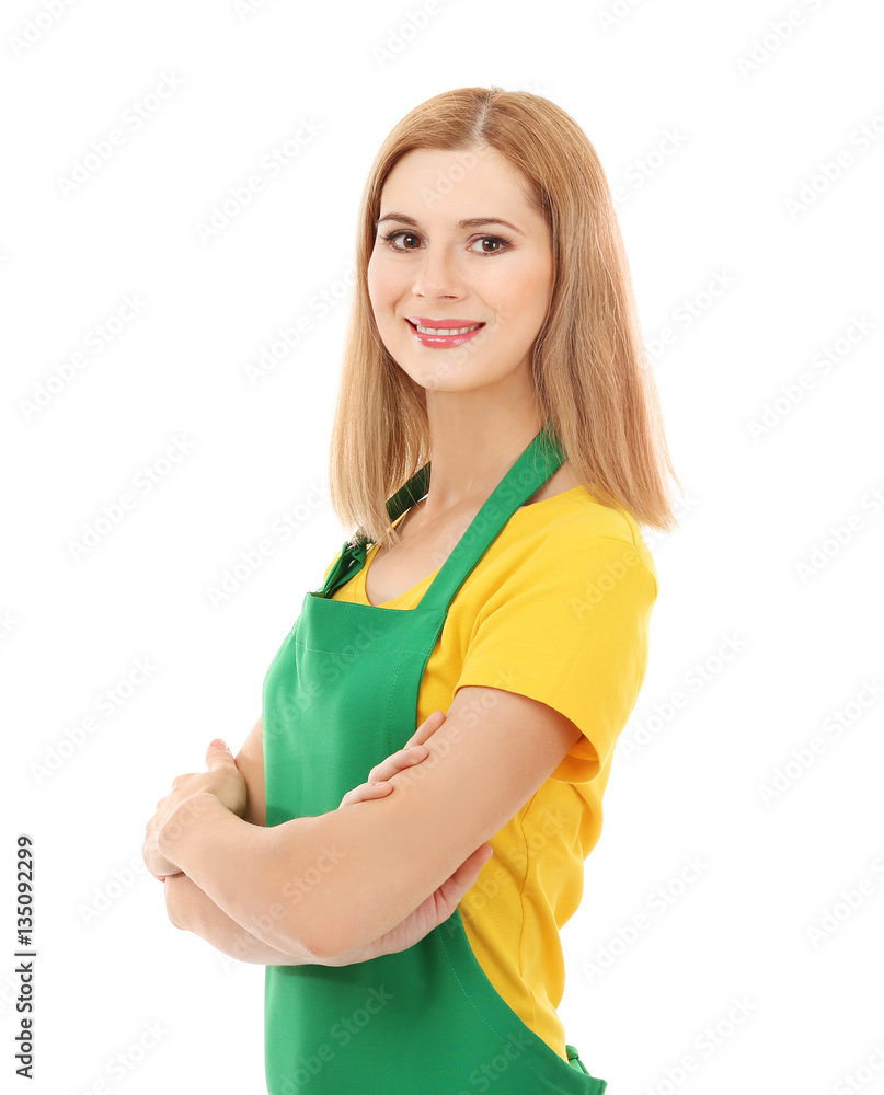 Beautiful woman in green apron isolated on white background Beautiful woman in green apron isolated on white background