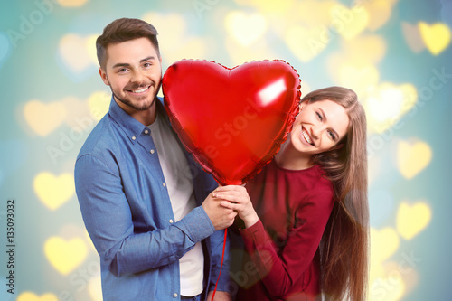 Young couple with heart sha...