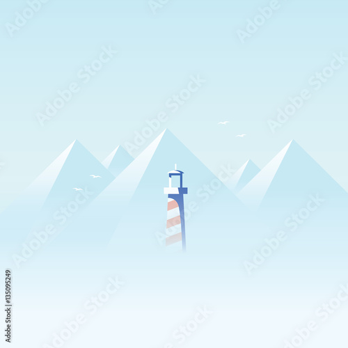 Lighthouse in dense fog or mist on the ocean, sea coast with mountains in the background landscape.