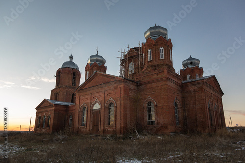 MIKHAYLOVKA VILLAGE, PENZA REGION, RUSSIA - OCTOBER 31, 2015: The restored Orthodox Life-giving Trinity Church at sunset. Built in 1871.