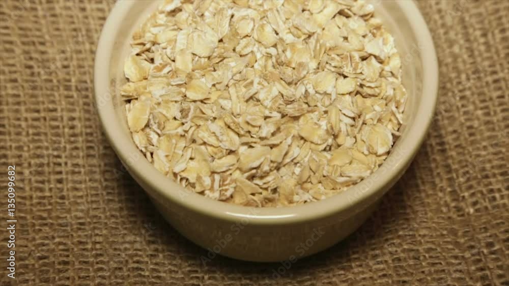 A portion of oatmeal in a bowl. Full hd video A portion of oatmeal in a bowl. Full hd video