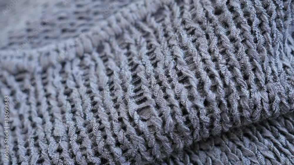 High quality gray knitwork fine texture close-up slow tilt 4K 2160p 30fps UltraHD footage - Fine grey kitting made sweater texture details shallow DOF 3840X2160 UHD tilting video High quality gray knitwork fine texture close-up slow tilt 4K 2160p 30fps UltraHD footage - Fine grey kitting made sweater texture details shallow DOF 3840X2160 UHD tilting video