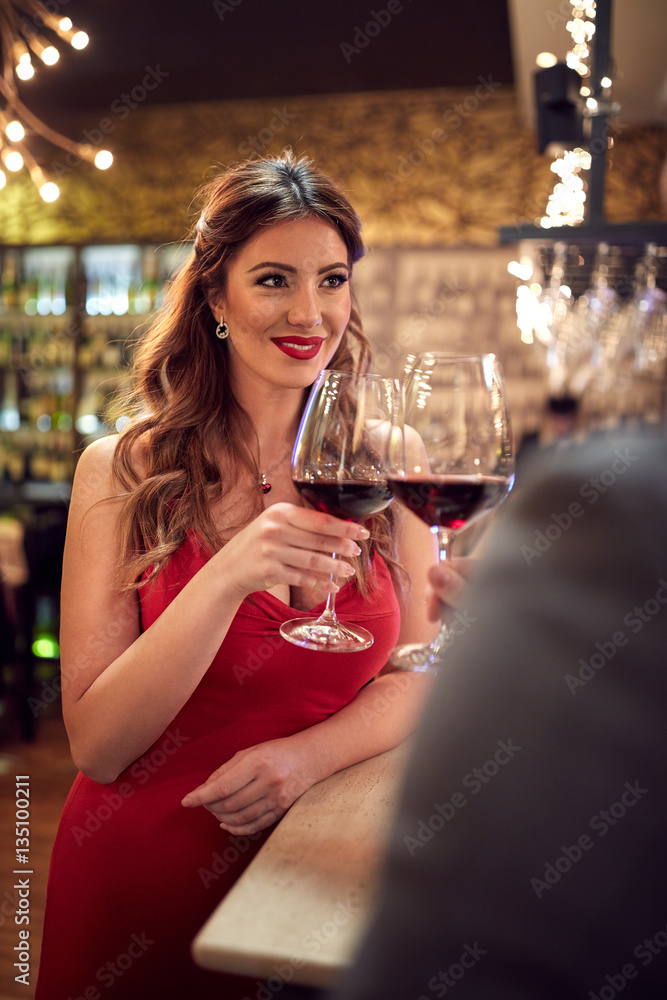 Couple toasting with glass of wine Couple toasting with glass of wine