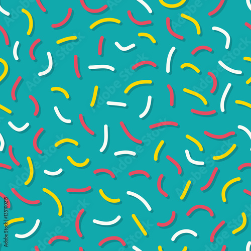 Trendy memphis style seamless pattern inspired by 80s, 90s retro fashion design. Colorful festive hipster background. Abstract doodle illustration from eighties. Blue, yellow, white, color sprinkles.
