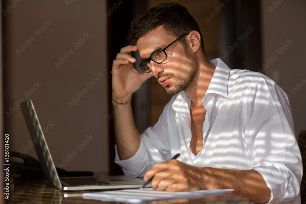 Pensive man working Pensive man working