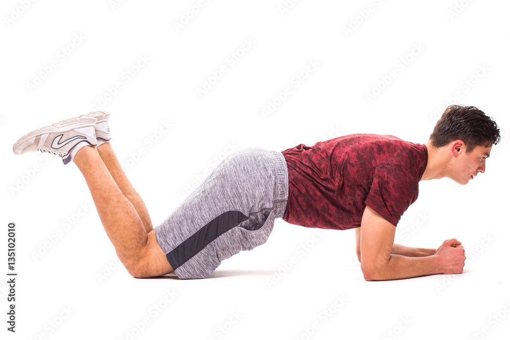 Plank on knees. Young man doing sport exercise. Plank on knees. Young man doing sport exercise.