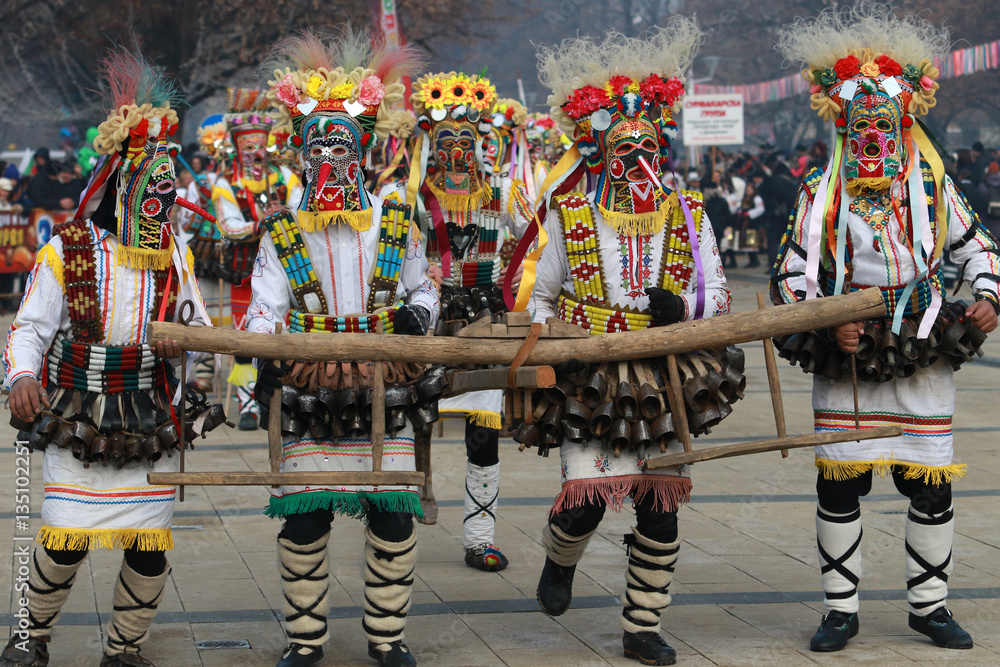 PERNIK, BULGARIA - JANUARY 29, 2017 - Masquerade festival Surva in Pernik, Bulgaria. People with mask called Kukeri dance and perform to scare the evil spirits
