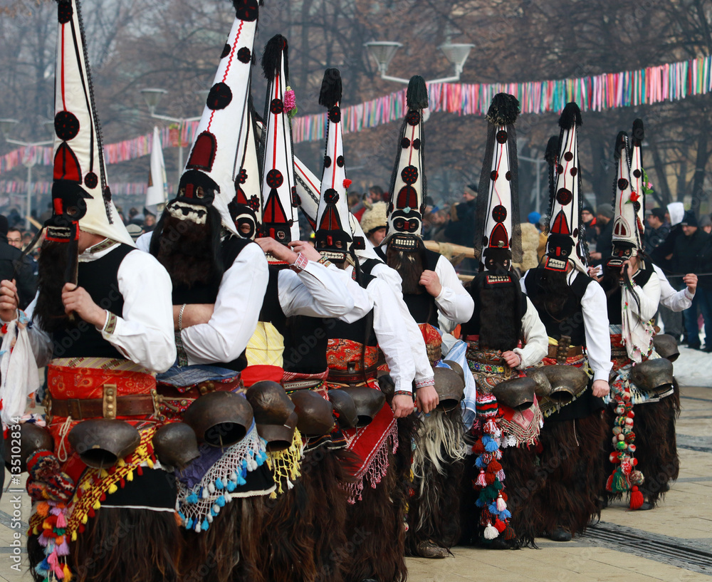 PERNIK, BULGARIA - JANUARY 29, 2017 - Masquerade festival Surva in Pernik, Bulgaria. People with mask called Kukeri dance and perform to scare the evil spirits