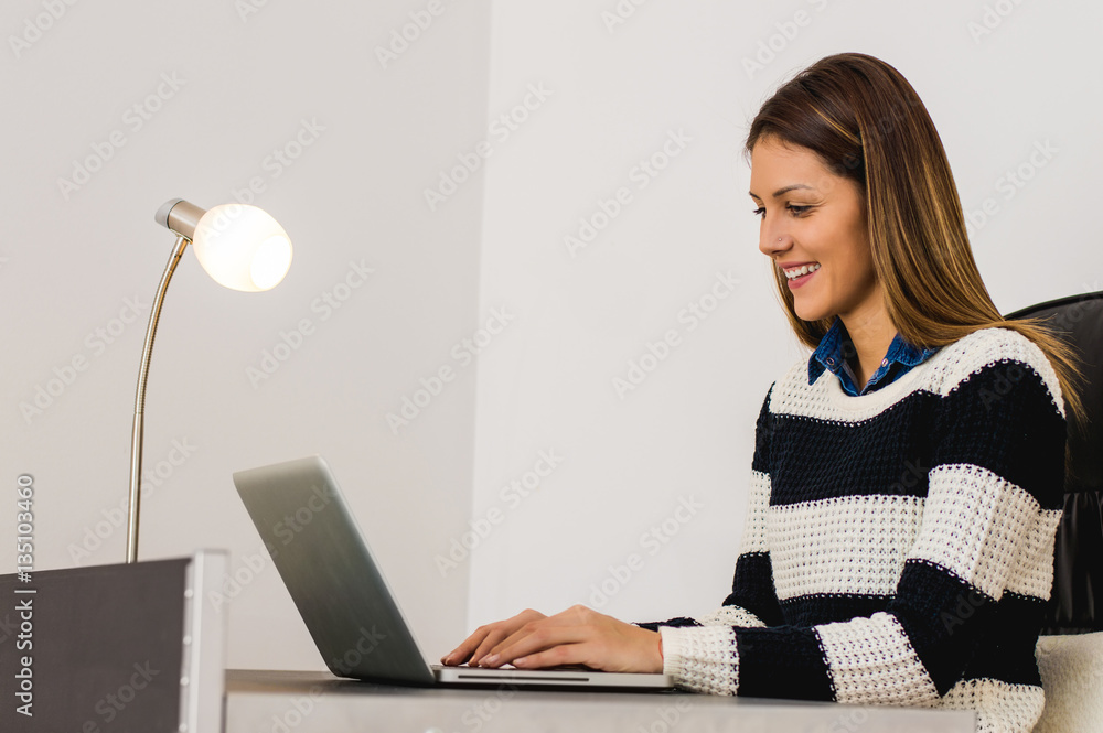 Attractive Young Woman Working from Home