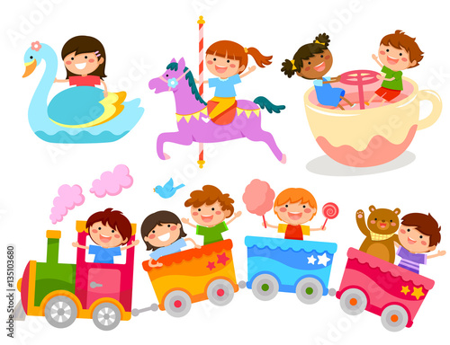 happy kids having fun on amusement park rides