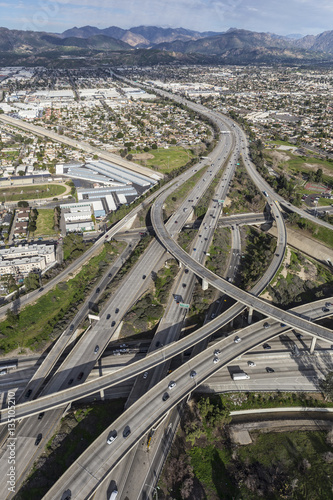 Aerial of the Golden State 5 and 118 freeway interchange in the San Fernando Valley area of Los Angeles California. 