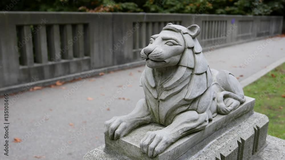 Motion of lion statue on Lions Gate Bridge at Stanley Park in Vancouver BC Canada Motion of lion statue on Lions Gate Bridge at Stanley Park in Vancouver BC Canada