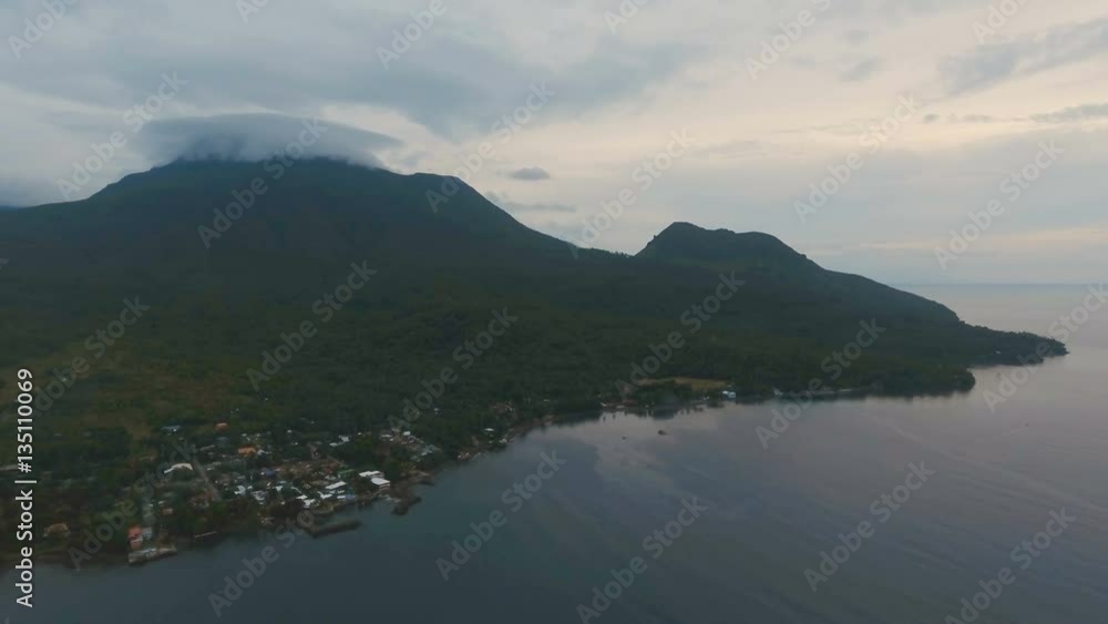 Aerial view coastline on tropical island with sea, trees and palms. Aerial footage.Aerial video from flying drone of amazingly beautiful landscape of nature with mountains,hills, rain forest. Seascape Aerial view coastline on tropical island with sea, trees and palms. Aerial footage.Aerial video from flying drone of amazingly beautiful landscape of nature with mountains,hills, rain forest. Seascape