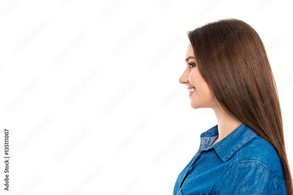 Side view portrait of young pretty smiling woman