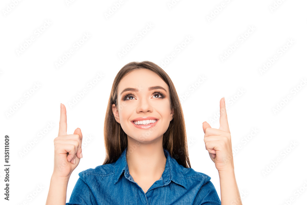 Portrait of young cheerful pretty girl gesturing up Portrait of young cheerful pretty girl gesturing up