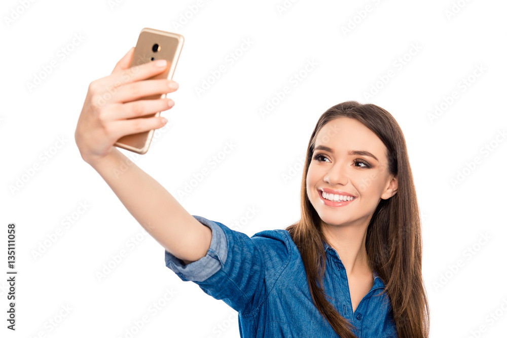 Pretty young happy woman making selfie on smartphone Pretty young happy woman making selfie on smartphone