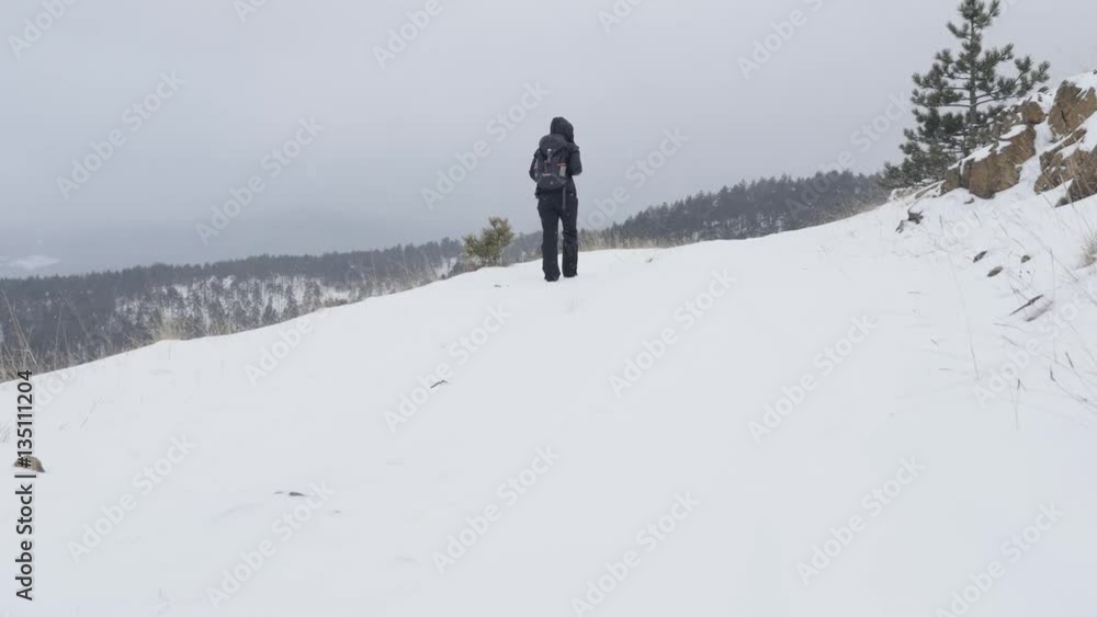 Woman hikes with mountain winter scenery 4K 2160p 30fps UltraHD footage -Female hiking over the snowed hill tops 3840X2160 UHD video Woman hikes with mountain winter scenery 4K 2160p 30fps UltraHD footage -Female hiking over the snowed hill tops 3840X2160 UHD video