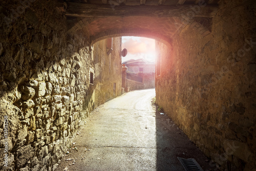 Hidden streets and corners of the arches in Montalcino, Tuscany. © Jarek Pawlak