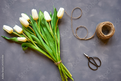 Bouquet of white tulips and accessories