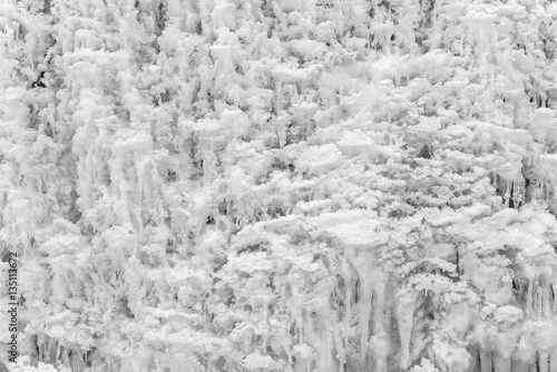 Frozen waterfall with ice in winter.