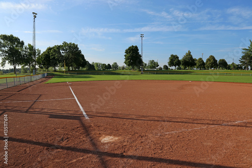 An empty softball field on a sunny day..