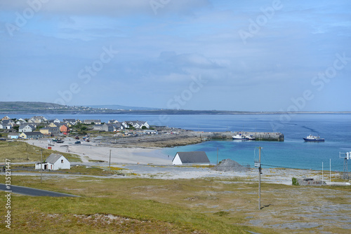 Overlooking the port on Inisheer Island from the graveyard at Caomhan church
