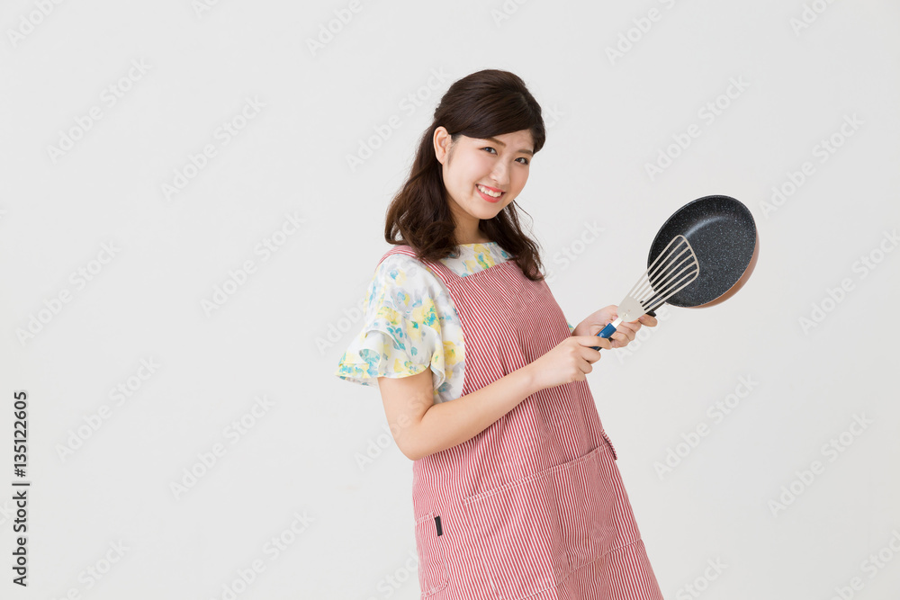 エプロンをした女性