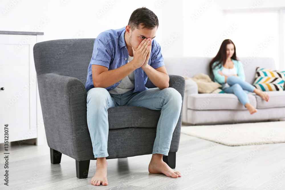 Young couple in quarrel at home Young couple in quarrel at home