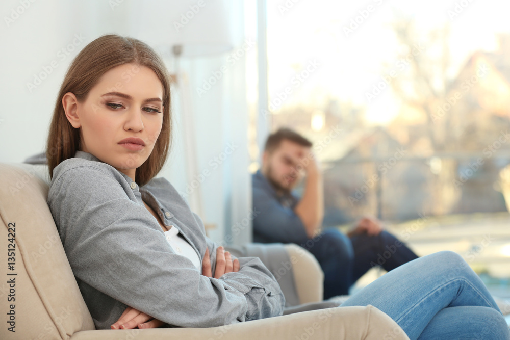 Young sad woman after quarrel with boyfriend at home Young sad woman after quarrel with boyfriend at home