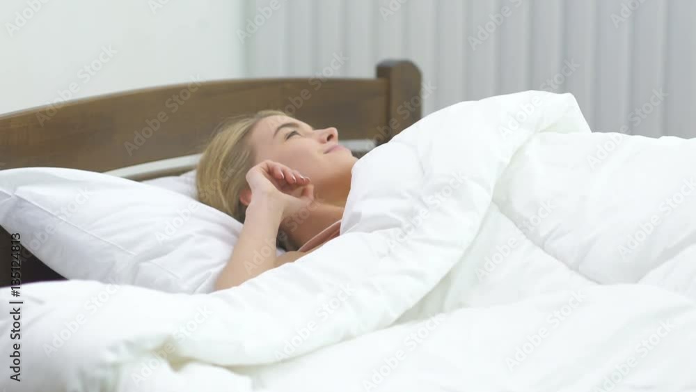 The beautiful woman sleeping on the bed. Real time capture The beautiful woman sleeping on the bed. Real time capture