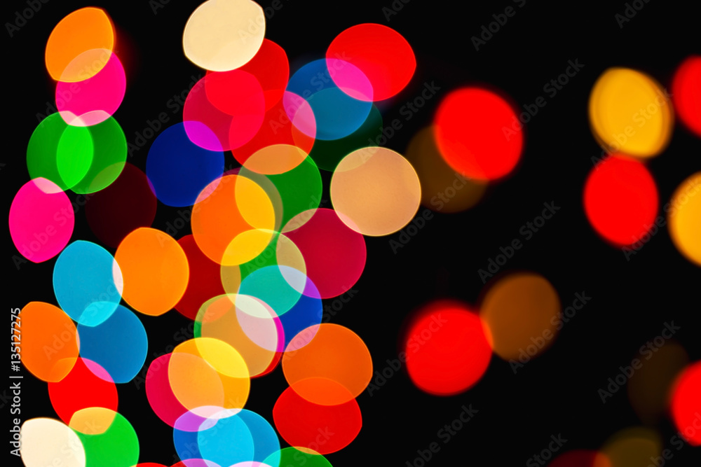 Bokeh blurred background of colored lights.