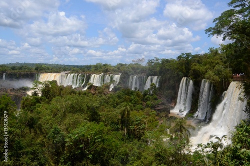 Iguazu falls Argentina on a blue sky day.